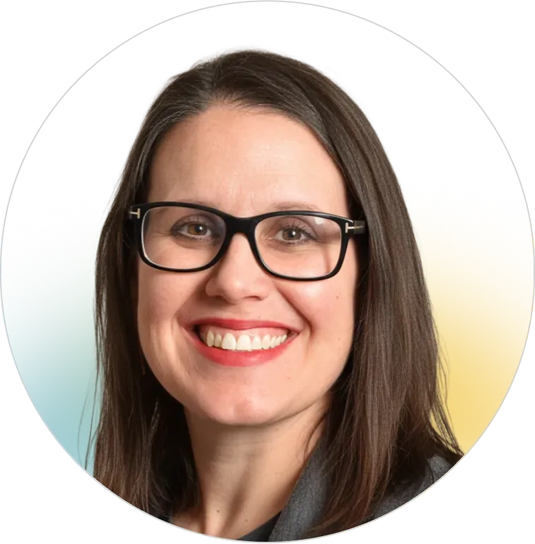 A professional headshot of a smiling woman with glasses and dark hair, representing the knowledgeable and approachable customer service team at Panorama Insurance.