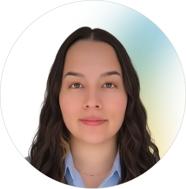 A professional headshot of a smiling young woman with long, dark wavy hair, representing the dedicated and friendly customer relations team at Panorama Insurance.