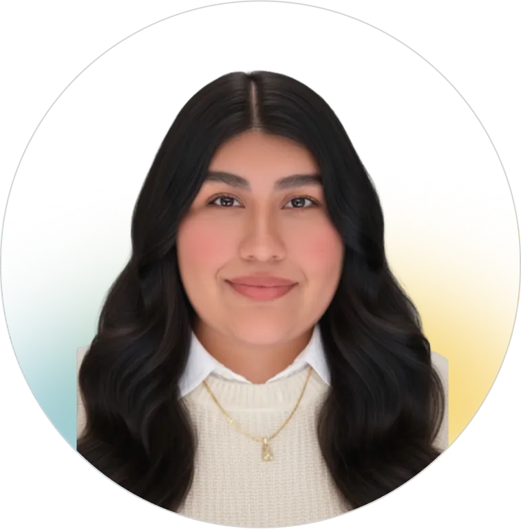 A professional headshot of a smiling young woman with long dark wavy hair wearing a white sweater, representing the dedicated and friendly customer service team at Panorama Insurance.
